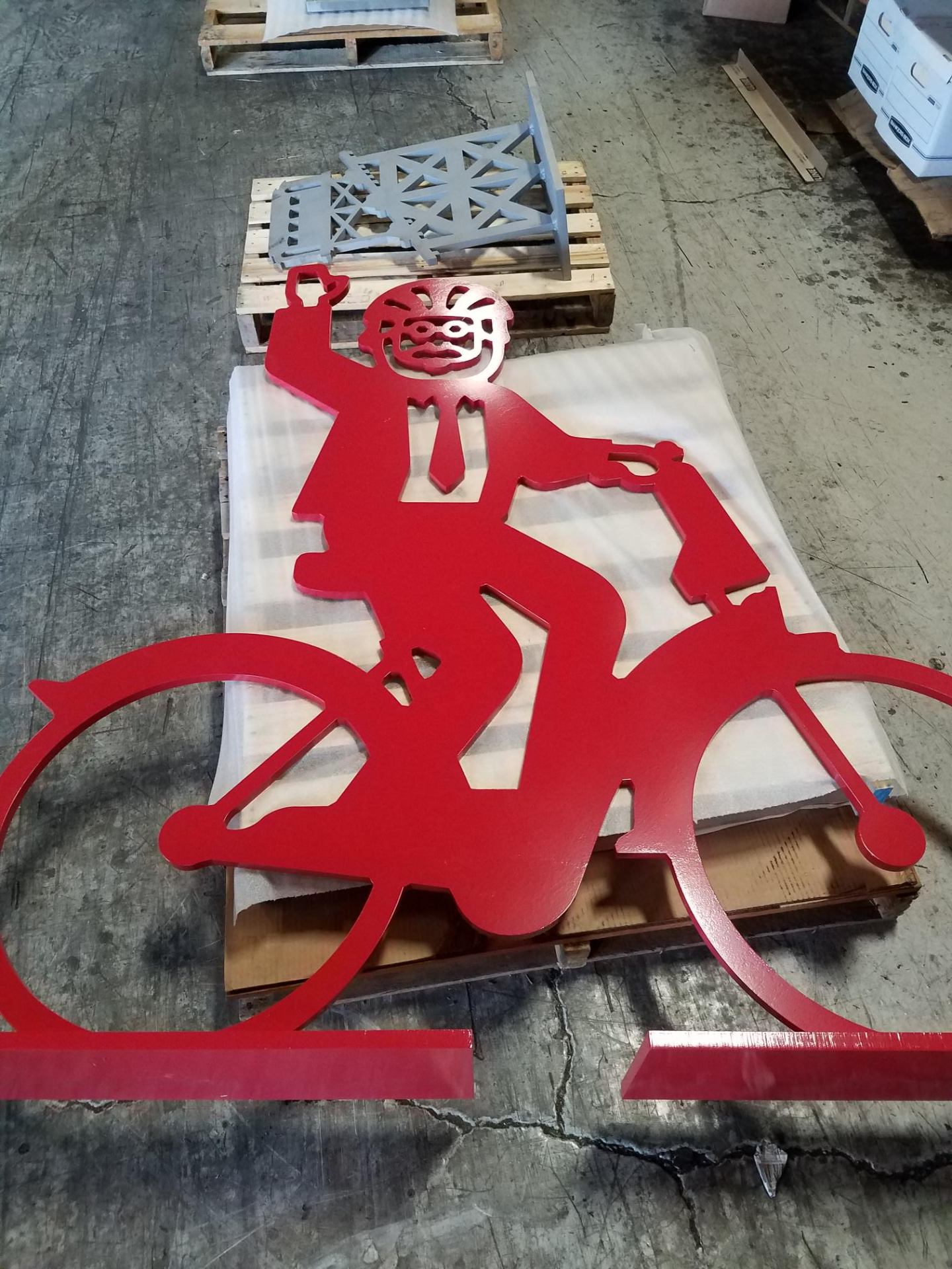 Large decorative bike rider cutout