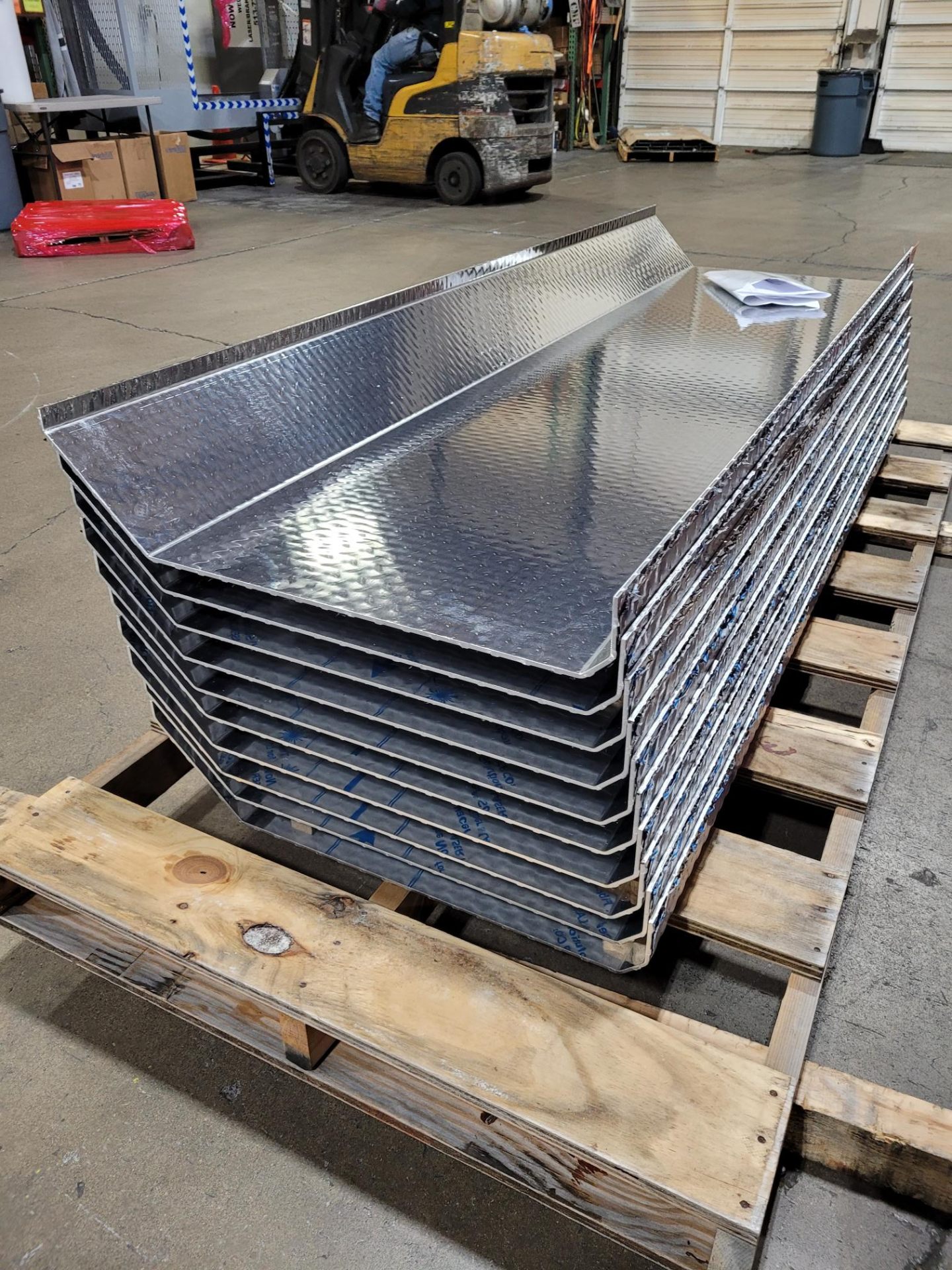 Diamond plate trays stacked