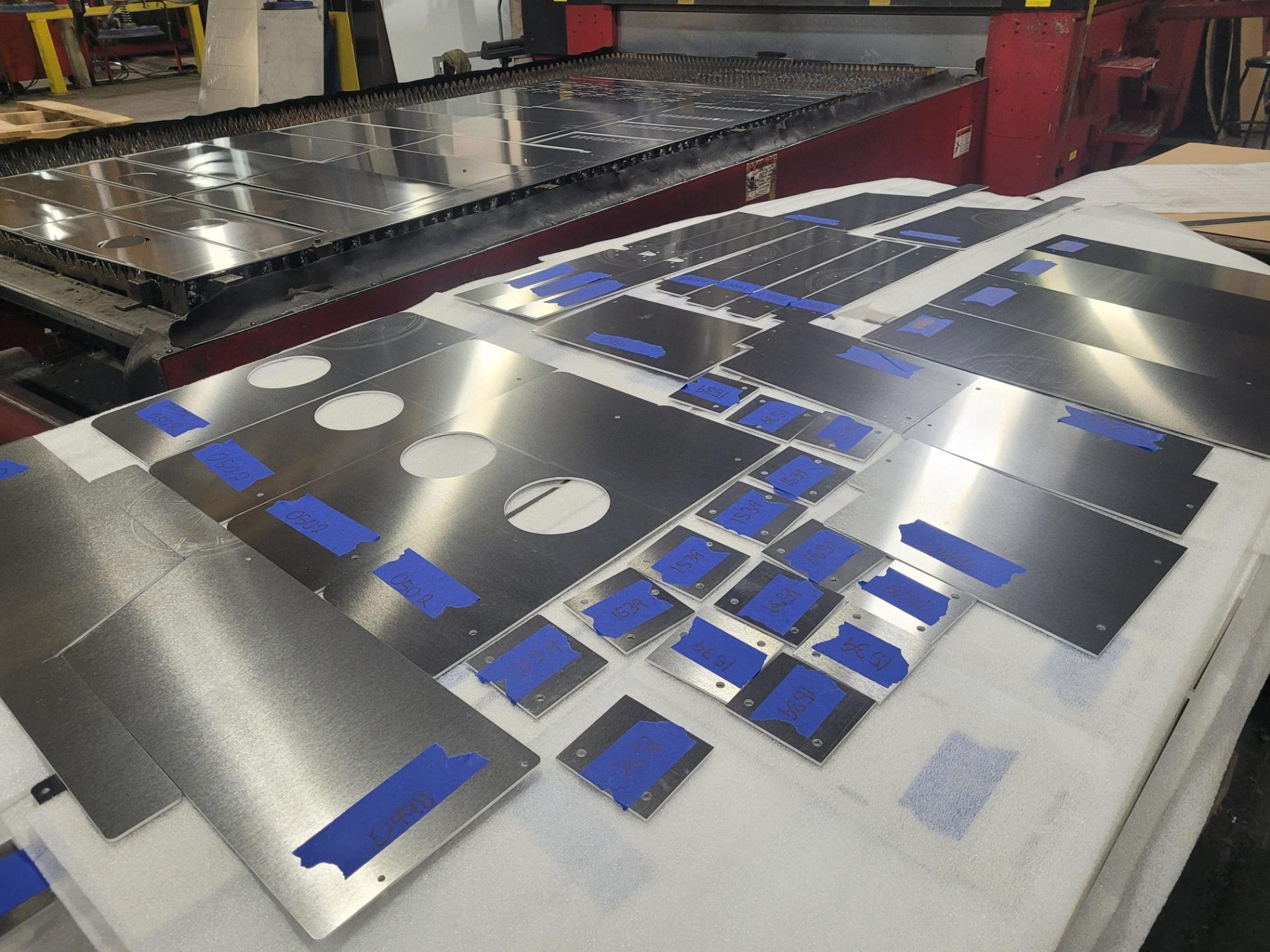 Labeled laser cut parts ready for shipping