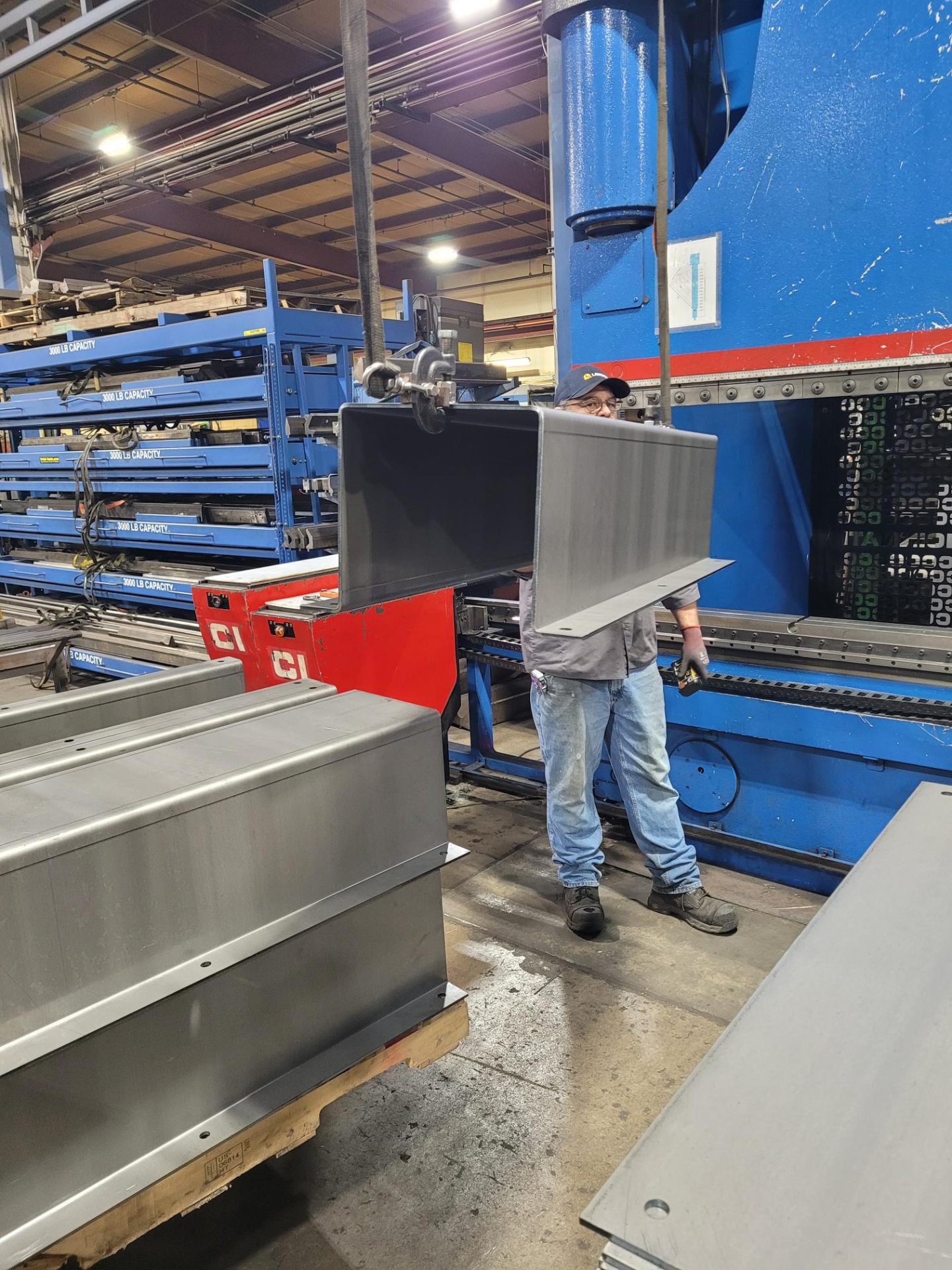 Operator handling large formed box