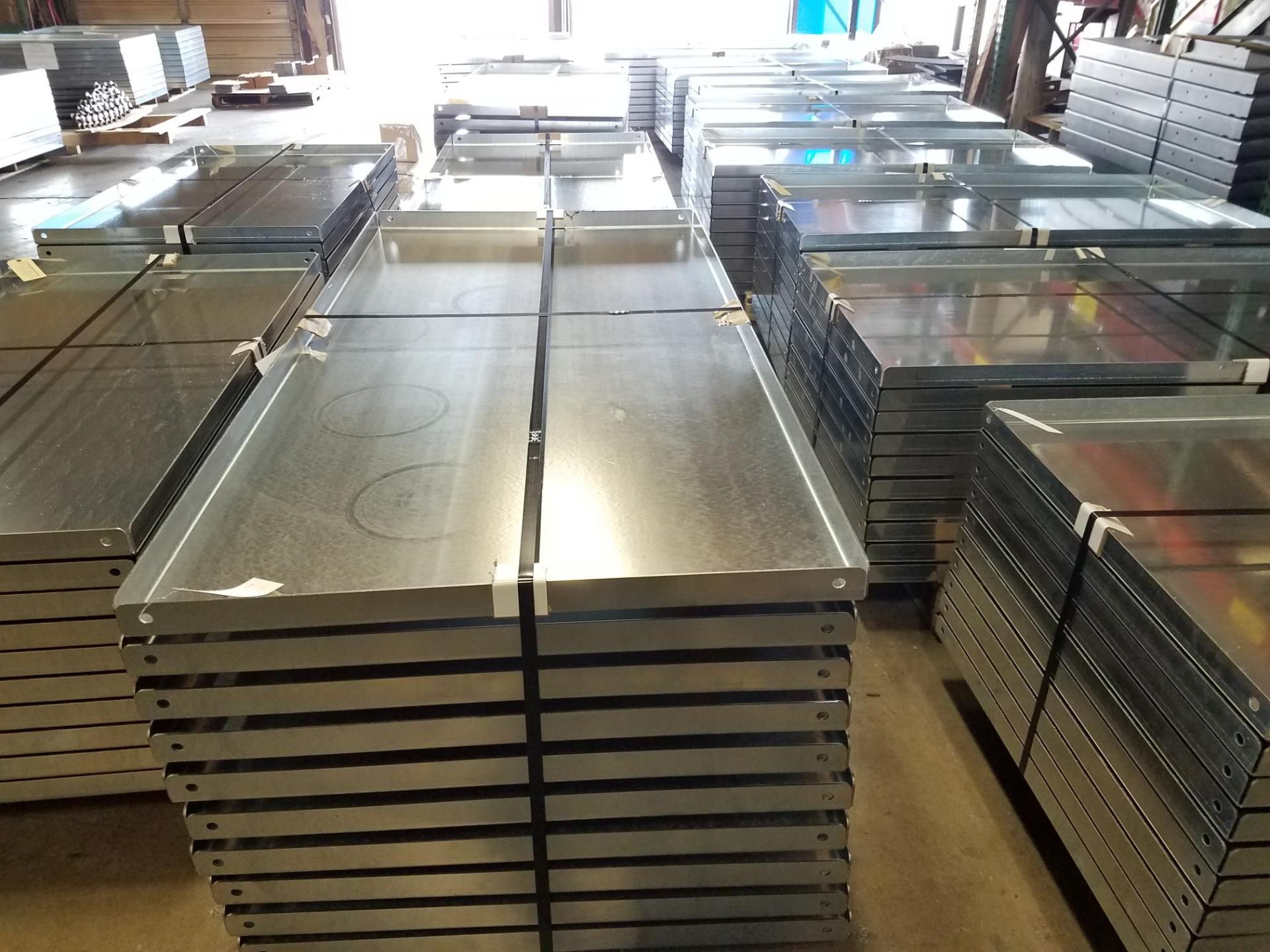 Stacked galvanized trays