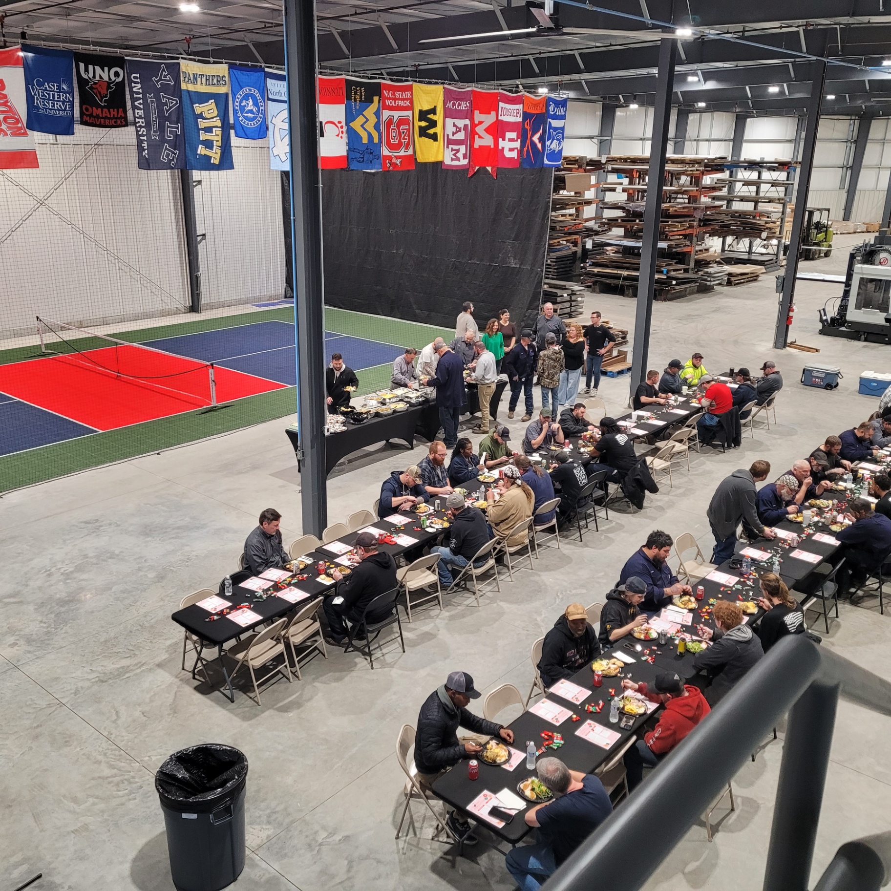 Cincinnati Metal Fabricating team at the 2025 Christmas party — overhead view