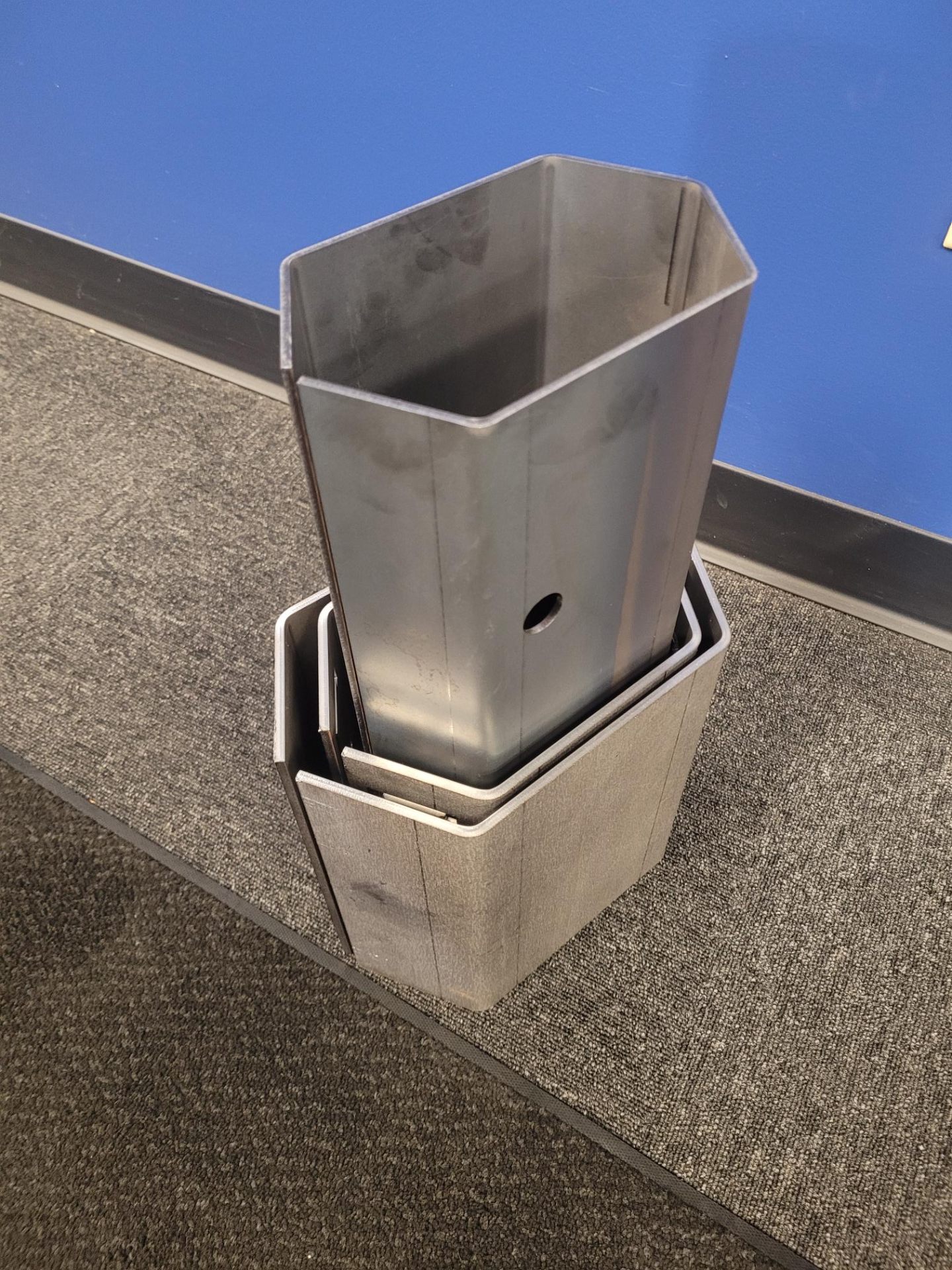 Nested hexagonal hoppers stacked for production stocking